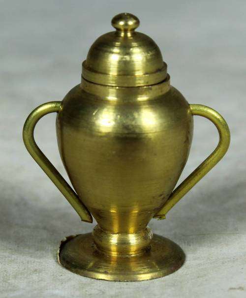 Miniature brass urn