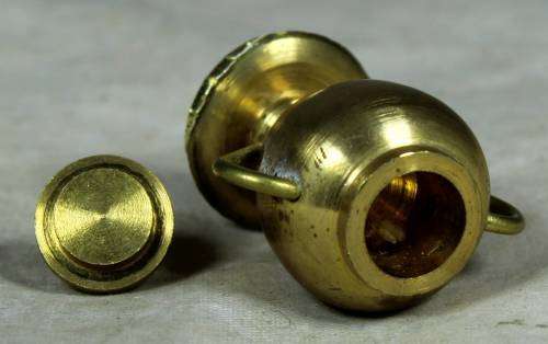 Miniature brass urn