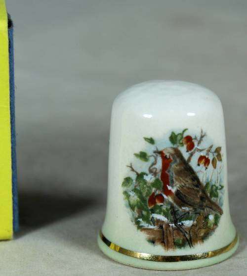 THIMBLE-PALISSY ENGLAND(BIRD IN A TREE)BID NOW!