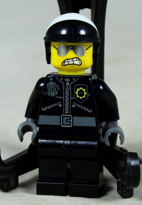 MINIATURE LEGO FIGURINE-BAD COP CROOKED SMILE(LEGO MOVIE) BID NOW