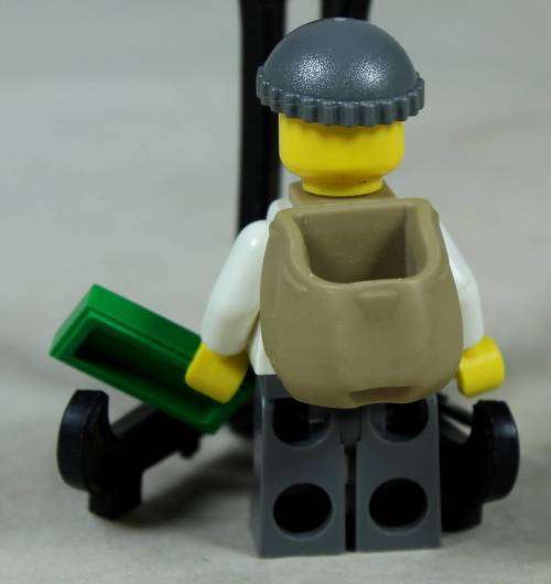 Miniature Lego figurine - Criminal with backpack and bank note