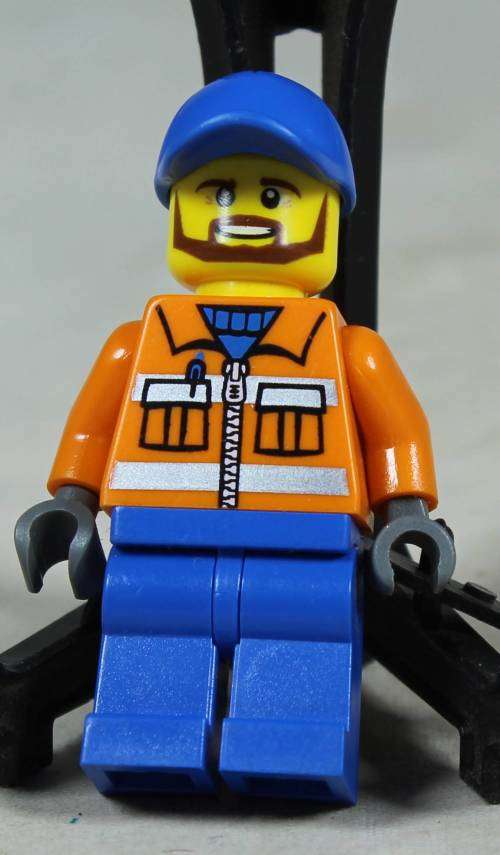 Miniature Lego figurine - Construction worker with a blue cap (TWN231)
