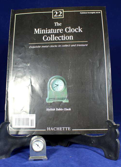 EXQUISITE HACHETTE MINITURE CLOCK WITH BOOKLET-STYLISH TABLE CLOCK BID NOW!