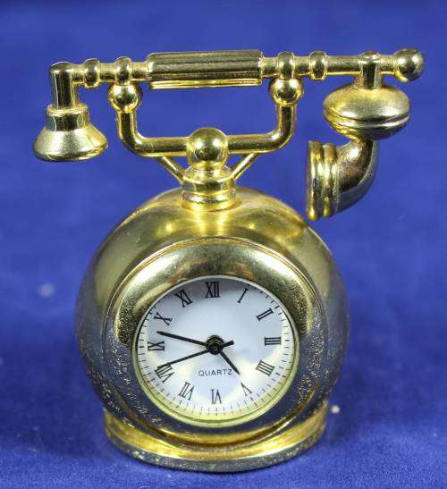 EXQUISITE HACHETTE MINIATURE METAL CLOCK WITH BOOKLET-ANTIQUE TELEPHONE BID NOW!!