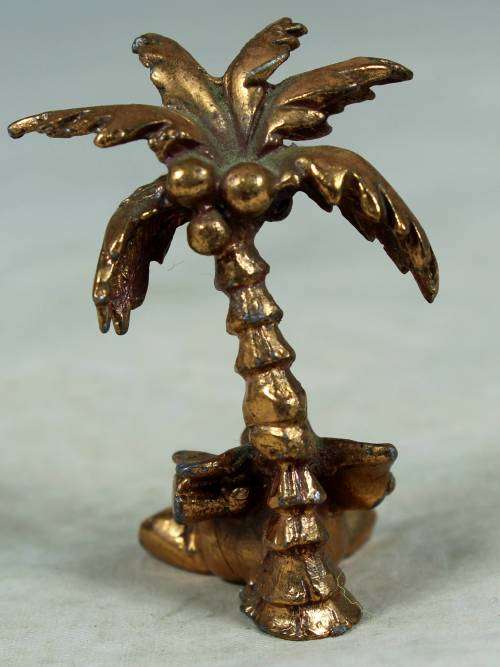 MINIATURE-BRASS COLOR LEAD ELEPHANT UNDER A PALM TREE-BID NOW!!