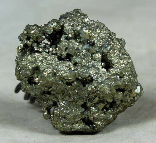 Miniature cowboy on a semi-precious rock