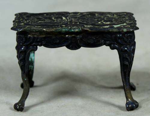 Miniature embossed rectangular table