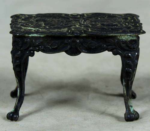 Miniature embossed rectangular table