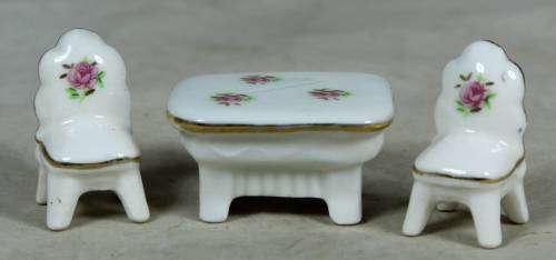 MINIATURE-MINIATURE PORCELAIN TABLE AND 2 CHAIRS BID NOW!!