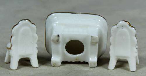 MINIATURE-MINIATURE PORCELAIN TABLE AND 2 CHAIRS BID NOW!!