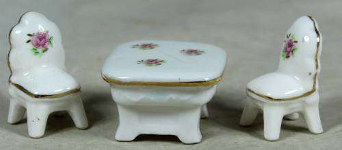 MINIATURE-MINIATURE PORCELAIN TABLE AND 2 CHAIRS BID NOW!!