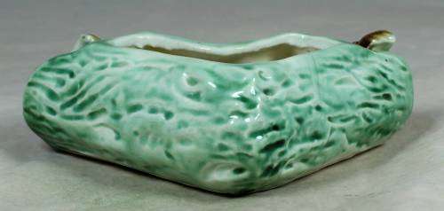 Log vase with squirrels