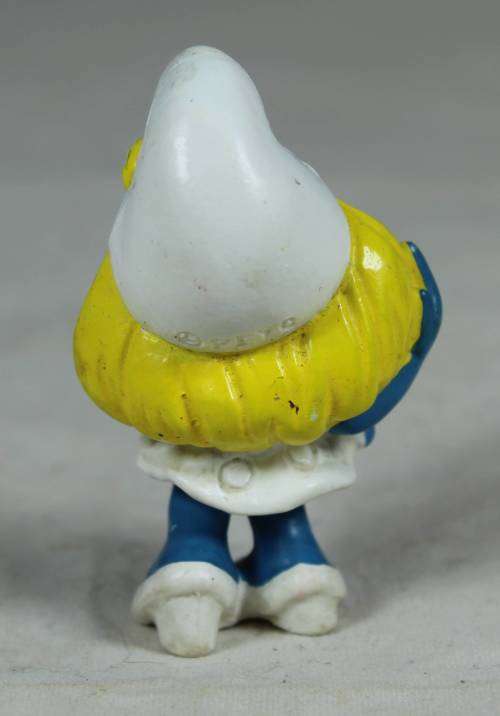 Smurfette with her hand on her hair