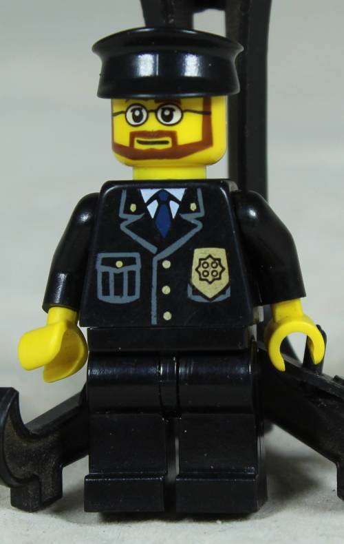 LEGO MINI FIGURINE-POLICEMAN WITH A BEARD AND A BLACK HAT BID NOW