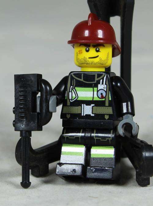 Lego mini figurine - Fireman with a scar and jackhammer (CTY0343)
