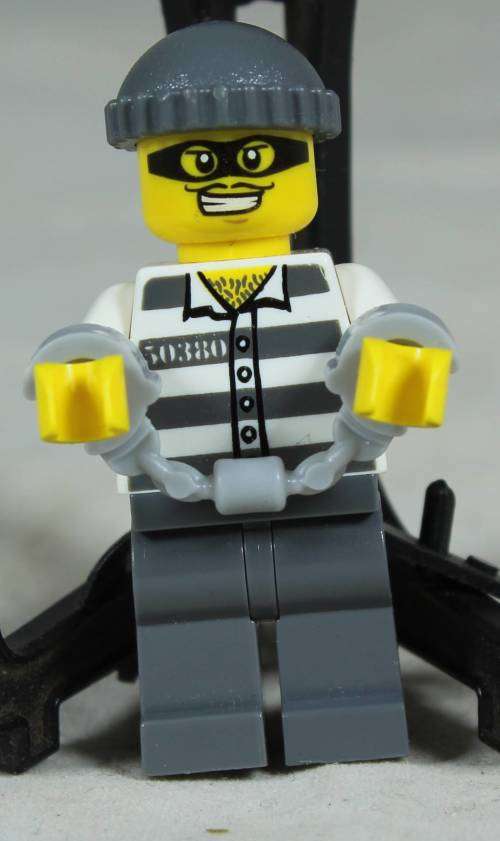 Lego mini figurine - Police jail prisoner 50380 with a mask and handcuffs (CTY0392)