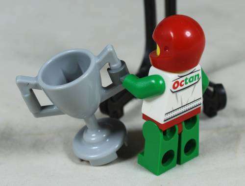 LEGO MINI FIGURINE-OCTAN RACING DRIVER WITH A TROPHY(CTY0435)BID NOW!!