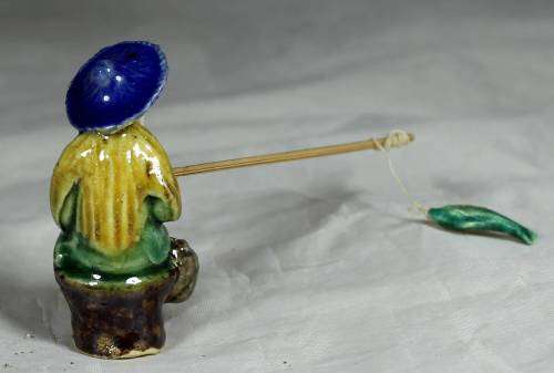 Mud Men - Seated man fishing