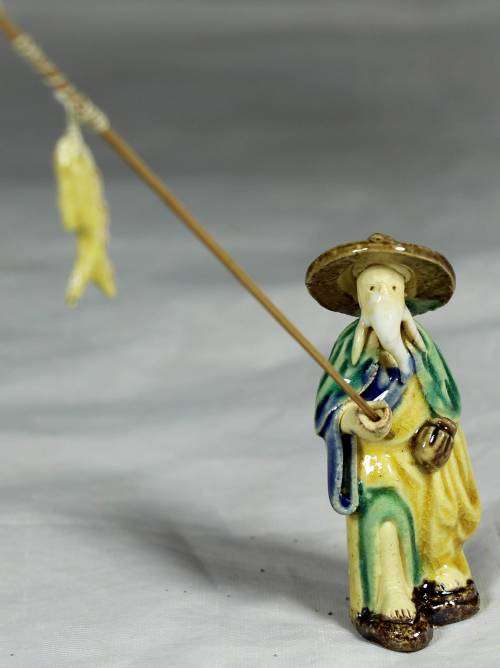 Mud Men - Old man fishing