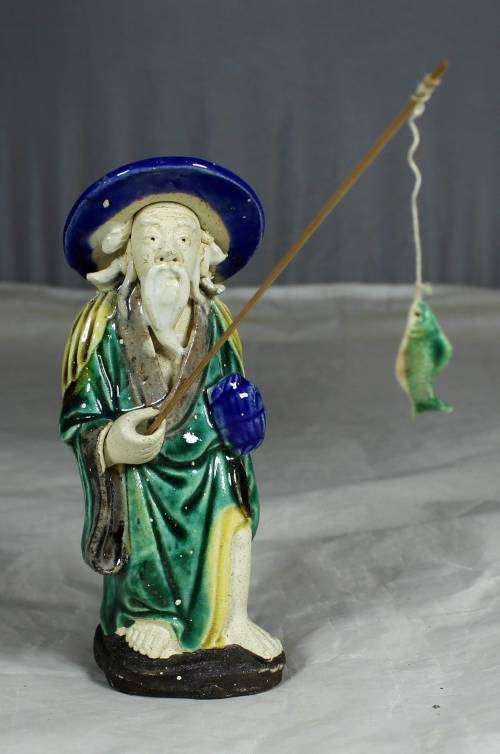 Collectible mud men - old man going fishing