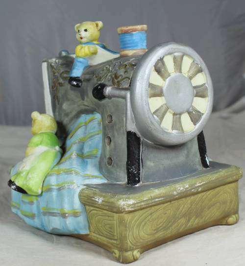 BEARS SITTING ON A LARGE SEWING MACHINE (ADORABLE) BID NOW !!