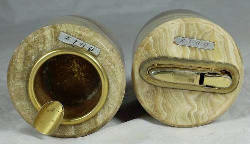 LOVELY LIGHTER AND ASHTRAY MOUNTED IN CARVED STONE BID NOW!