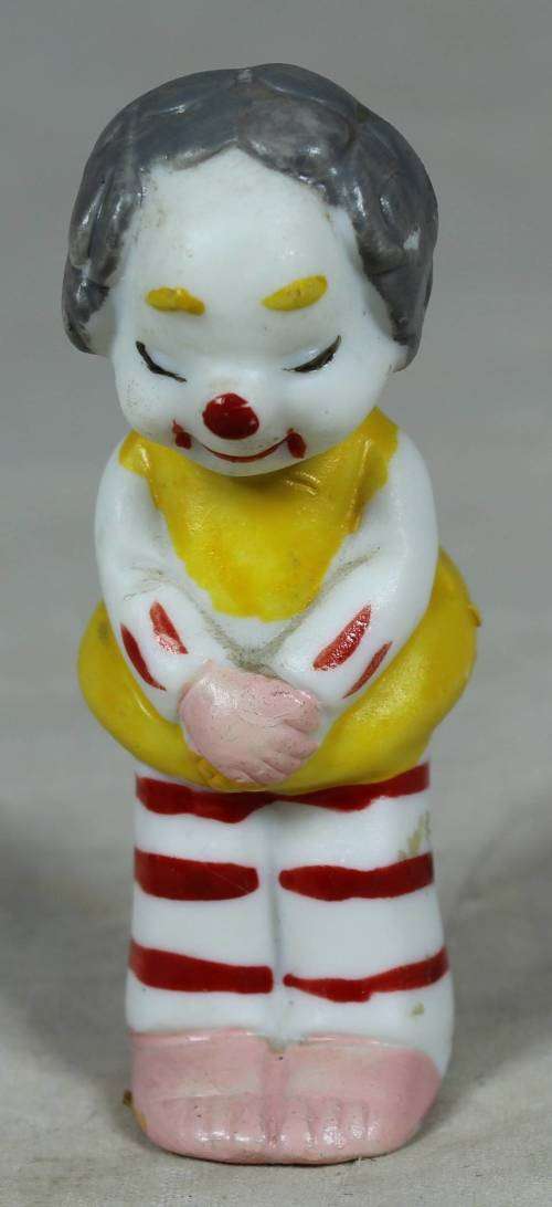 Miniature clown praying