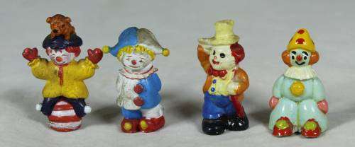 A SET OF 4 VERY SMALL CLOWNS (LOVELY) BID NOW!!!