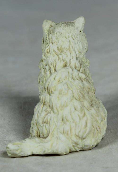 MINIATURE SERIOUS LOOKING WHITE CAT (AMUSING) BID NOW!!!