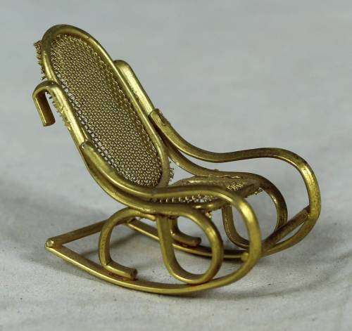 Miniature brass rocking chair