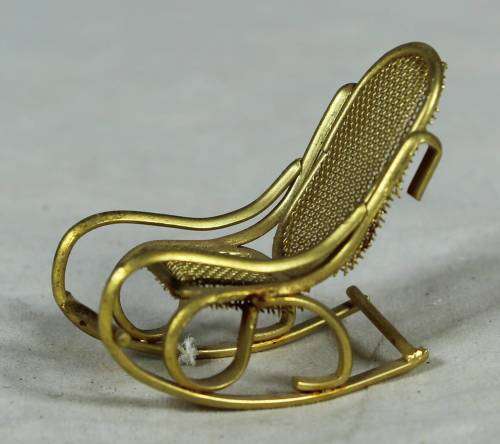 Miniature brass rocking chair