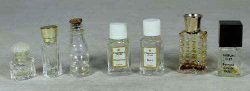 Set of seven miniature perfume bottles
