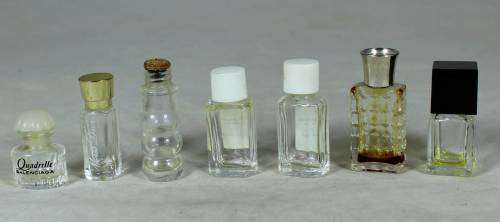 Set of seven miniature perfume bottles