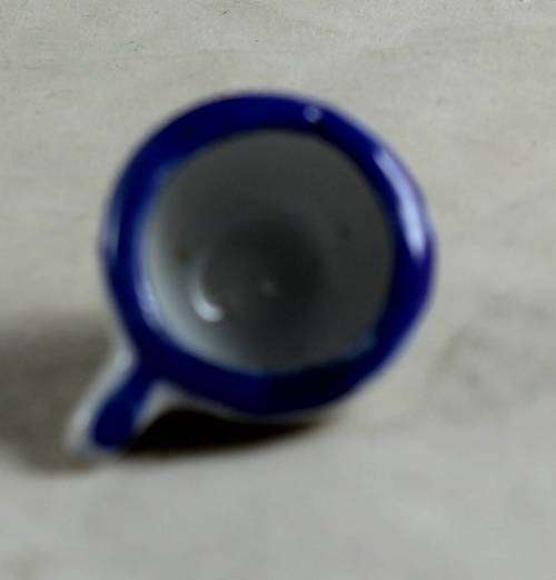 MINIATURE BLUE AND WHITE CUP(LOVELY)BID NOW!!