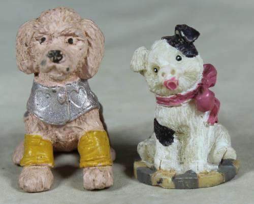 Miniature pair of hard plastic doggies