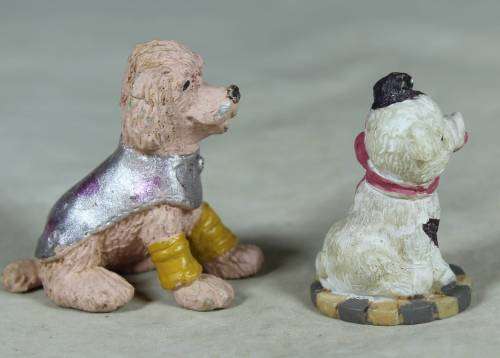 Miniature pair of hard plastic doggies