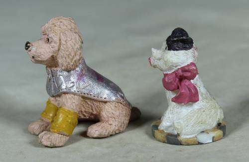 Miniature pair of hard plastic doggies