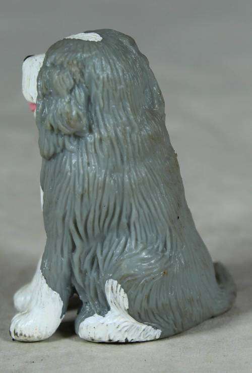 MEG plastic seated dog