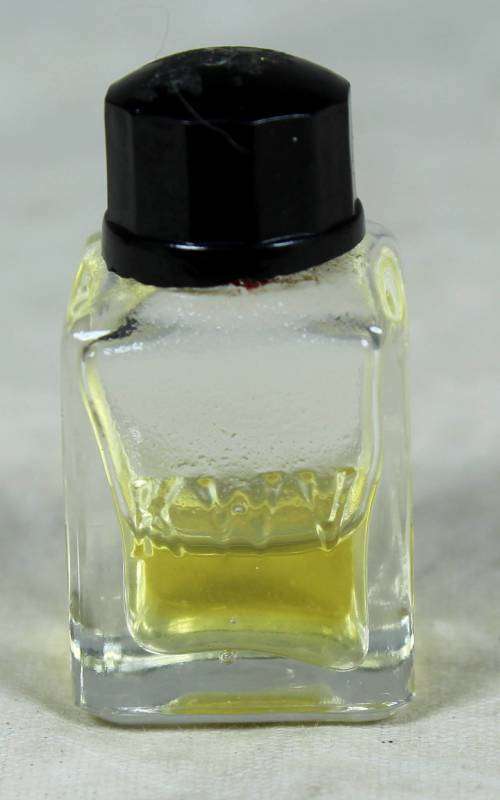 HALF FULL MINIATURE BOTTLE OF KWV PERFUME 4ML (BEAUTIFUL) BID NOW!!