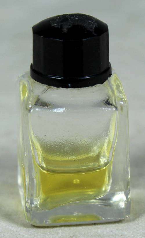 HALF FULL MINIATURE BOTTLE OF KWV PERFUME 4ML (BEAUTIFUL) BID NOW!!