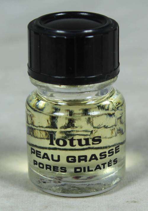 FULL MINIATURE BOTTLE OF HUILE CLARINS LOTUS PEAU GRASSE PERFUME (BEAUTIFUL) BID NOW!!