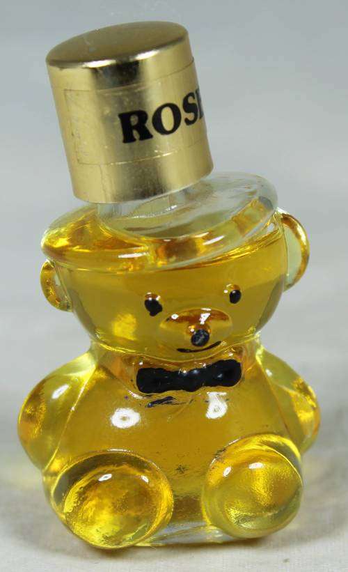 FULL BOTTLE OF ROSE BEAR PERFUME-BID NOW!!