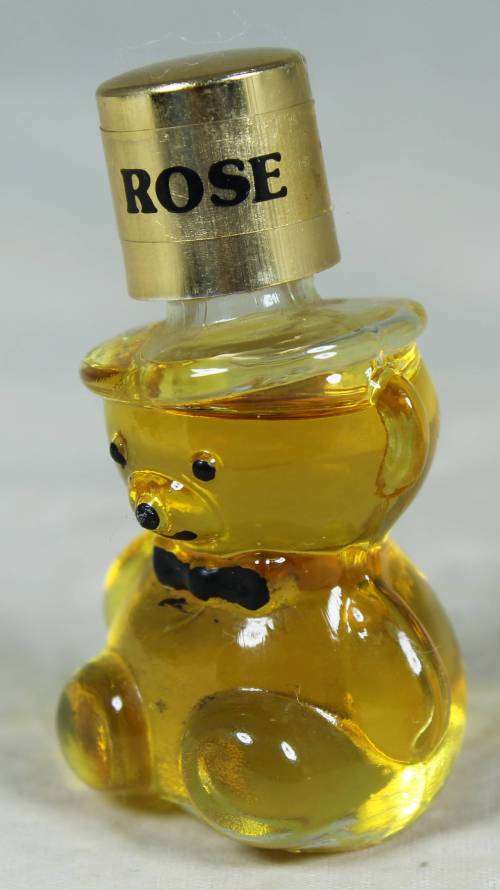 FULL BOTTLE OF ROSE BEAR PERFUME-BID NOW!!