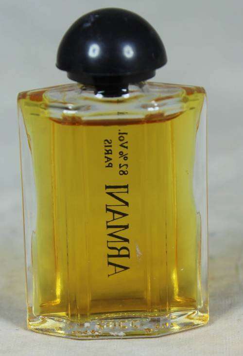 FULL MINIATURE BOTTLE OF GIORGIO ARMANI PERFUME 5ML-BID NOW!!