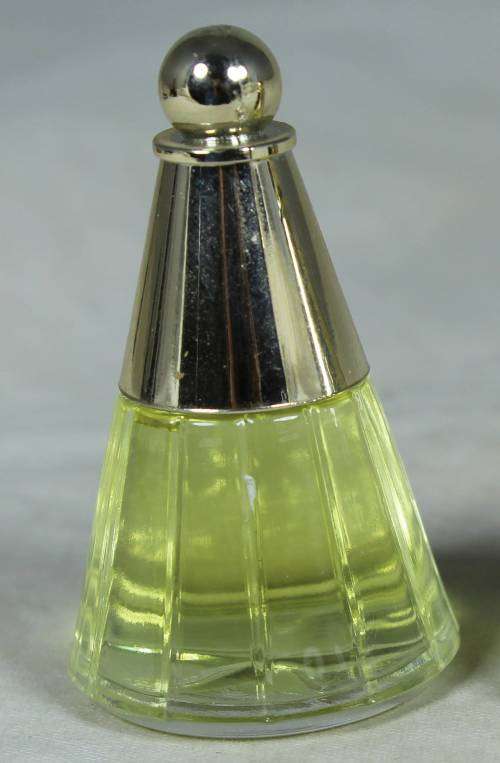 Full miniature bottle of Avon perfume