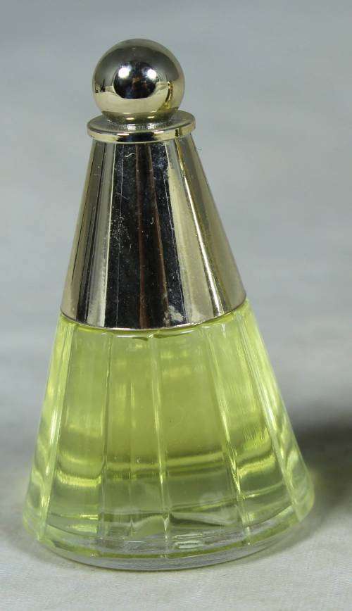 Full miniature bottle of Avon perfume