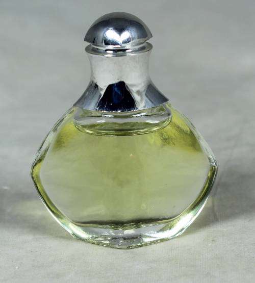 FULL MINIATURE BOTTLE OF WOMAN OF EARTH PERFUME-BID NOW!!