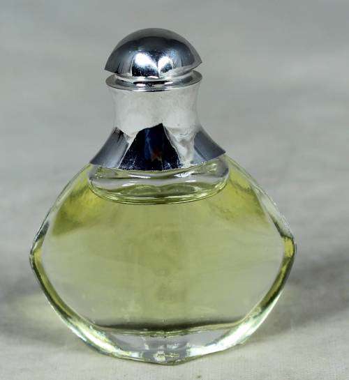 FULL MINIATURE BOTTLE OF WOMAN OF EARTH PERFUME-BID NOW!!