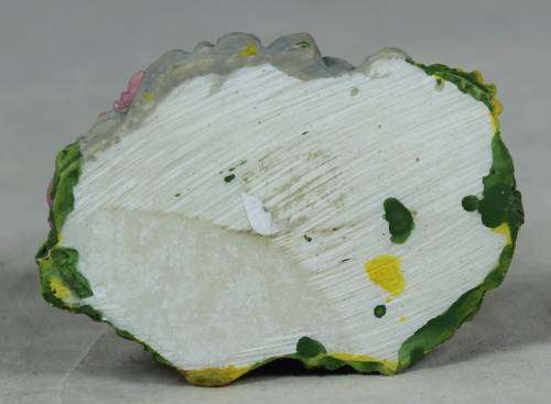 Small elephant with basket of oranges