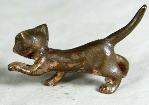 Miniature brass feral cat